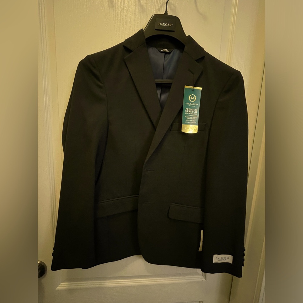 Brand is J.M. HAGGAR, size 38 short